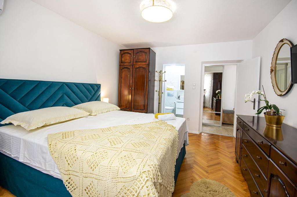 Postel nebo postele na pokoji v ubytování Apartments Filipeti
