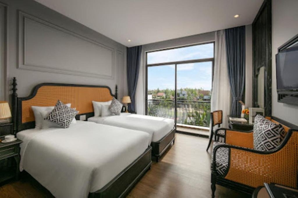 Giường trong phòng chung tại Serene Nature Hotel & Spa