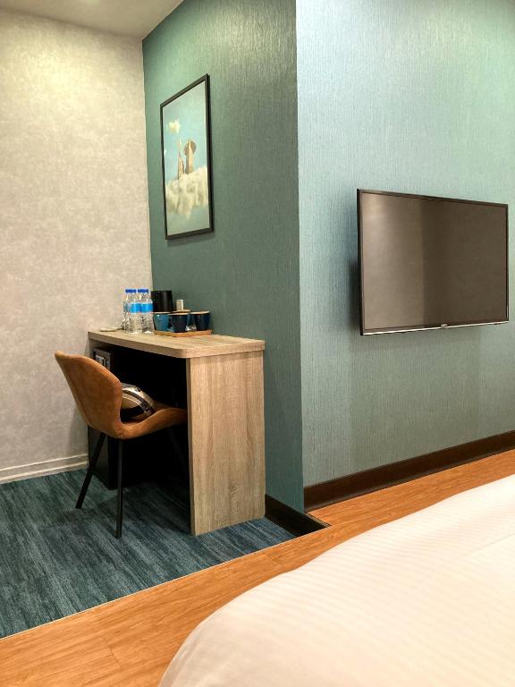 Katil atau katil-katil dalam bilik di 西門雲町旅店 Sky Gate Hotel
