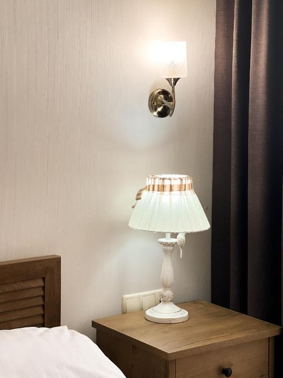 Postel nebo postele na pokoji v ubytování Villa Blanc
