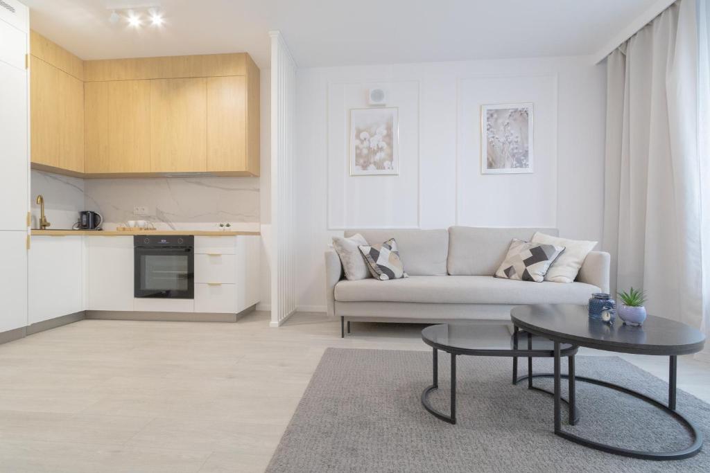 Kuchyňa alebo kuchynka v ubytovaní Glow Apartments, Gdańsk Śląska 12