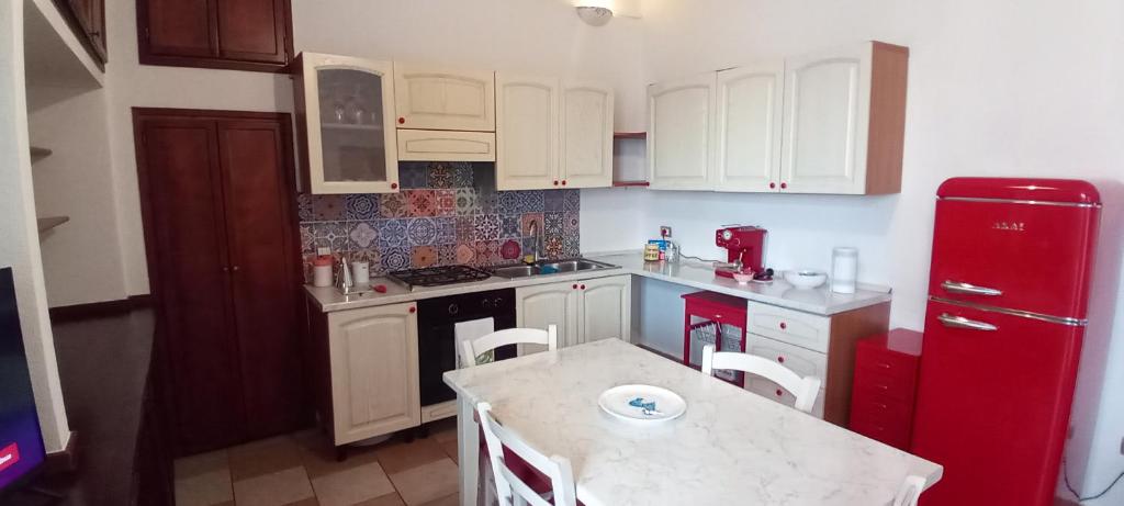 Kuchyň nebo kuchyňský kout v ubytování Casa Gonario