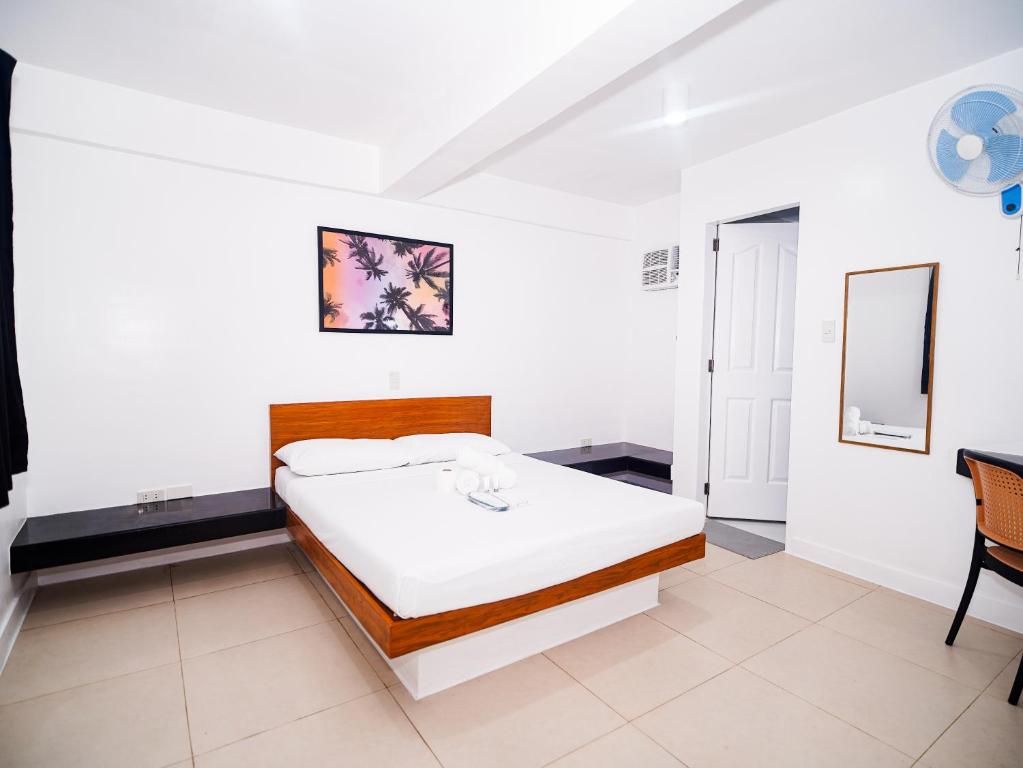 Postel nebo postele na pokoji v ubytování CJS Boracay Joint