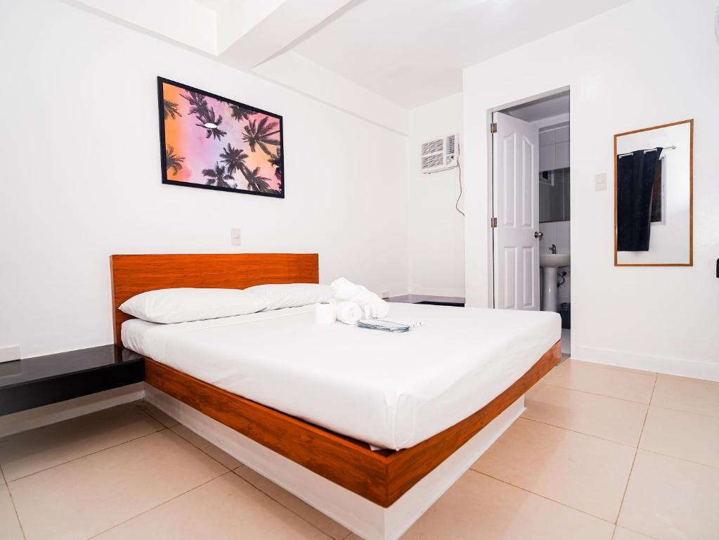 Postel nebo postele na pokoji v ubytování CJS Boracay Joint