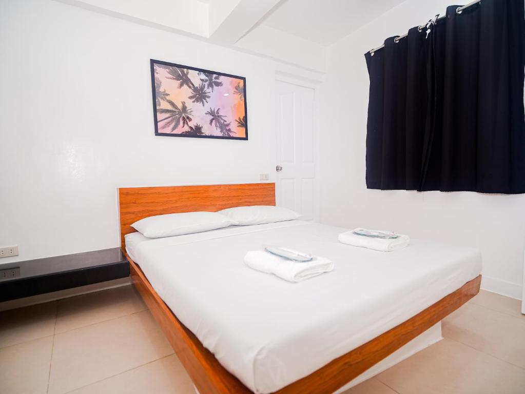 Postel nebo postele na pokoji v ubytování CJS Boracay Joint