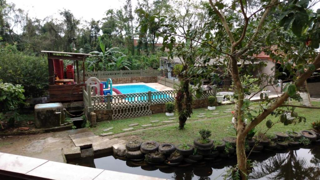 Kolam renang di atau dekat dengan Pousada Recanto do Zeca casa 3