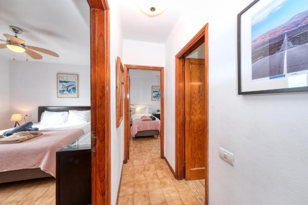 A bed or beds in a room at Casa San Valentin con piscina privada