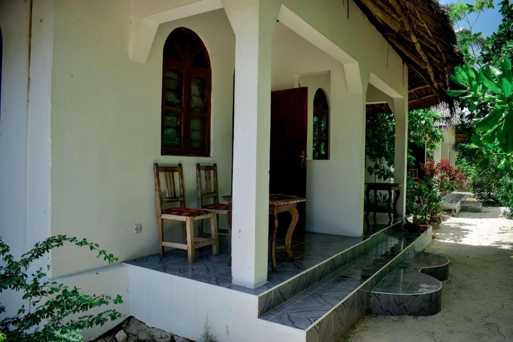Blue Earth Beach Bungalow - Habitación Cuádruple Con Vista Al Mar