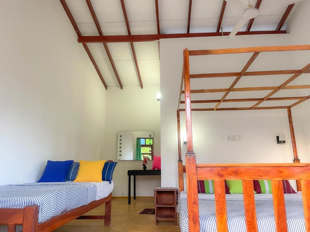 Postel nebo postele na pokoji v ubytování Summer lodge-Tangalle