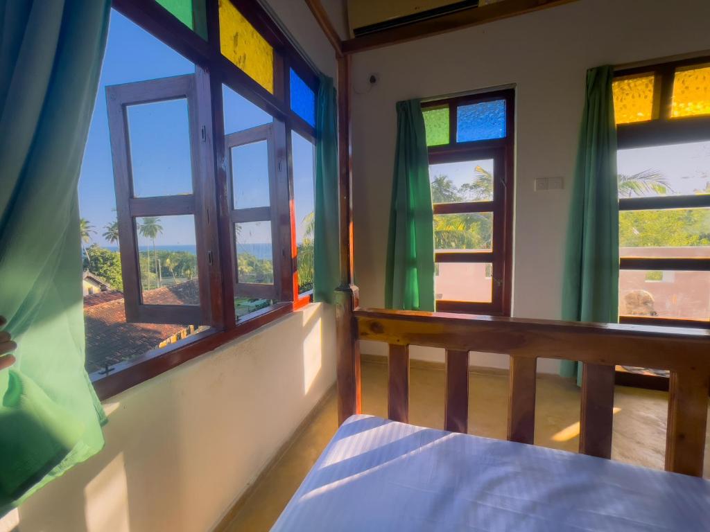 Postel nebo postele na pokoji v ubytování Summer lodge-Tangalle