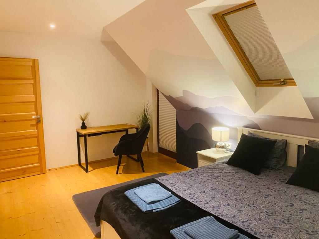 Letto o letti in una camera di Scenic Chalet Malowniczy Domek