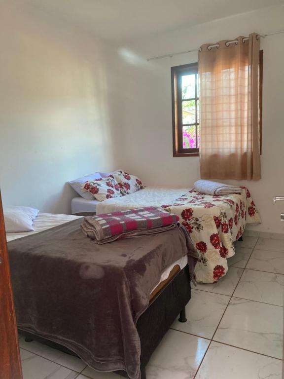 Postel nebo postele na pokoji v ubytování Apartamento Completo 2km do centro 301