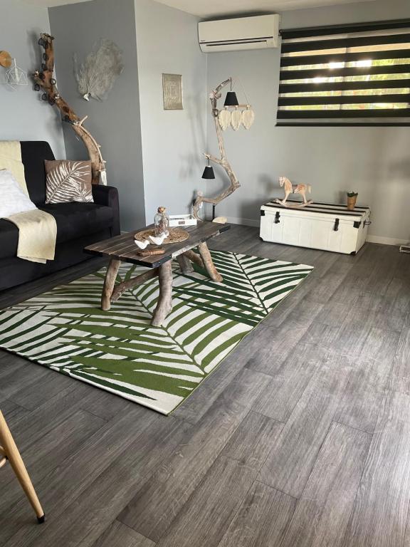 Posezení v ubytování Appartement vue mer, Case Pilote