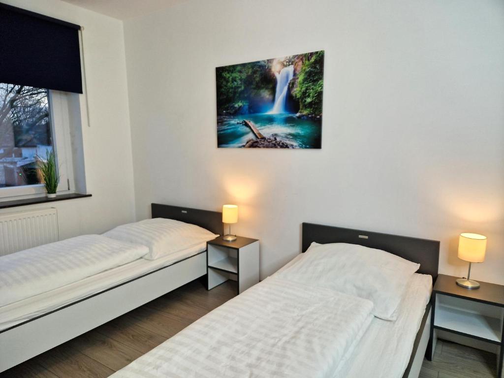 Postel nebo postele na pokoji v ubytování Meribu G31 Wohnung für Monteure und Arbeiter