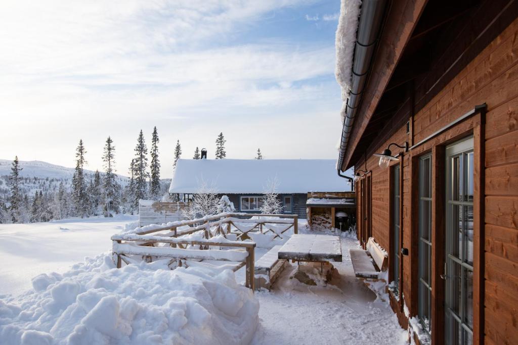 Luxurious cottage with sauna overlooking mountains v zimě