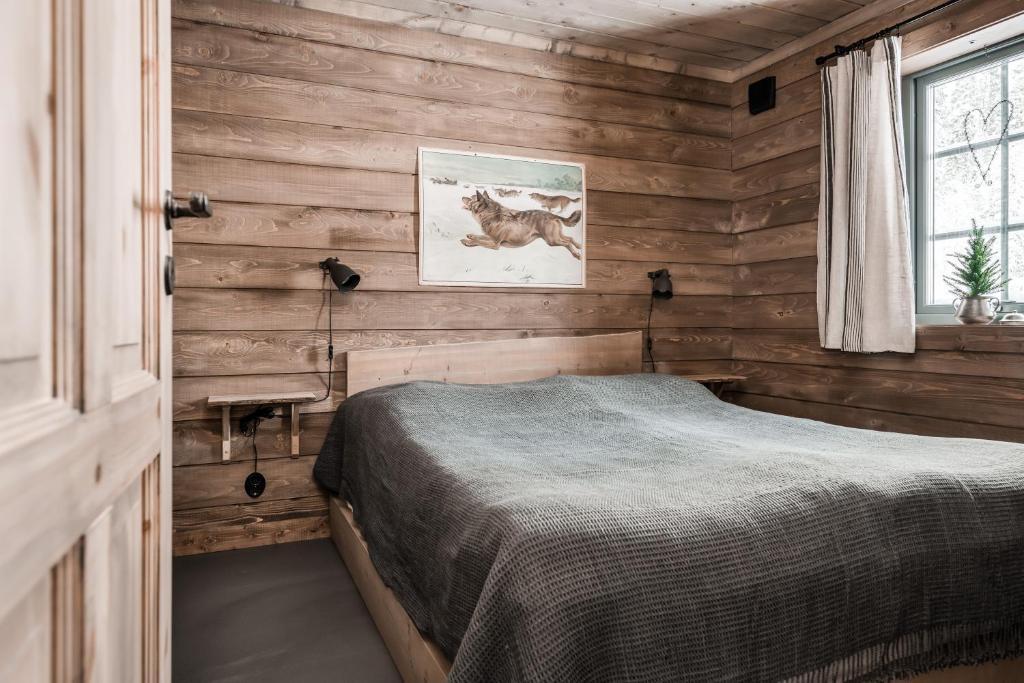 Postel nebo postele na pokoji v ubytování Luxurious cottage with sauna overlooking mountains