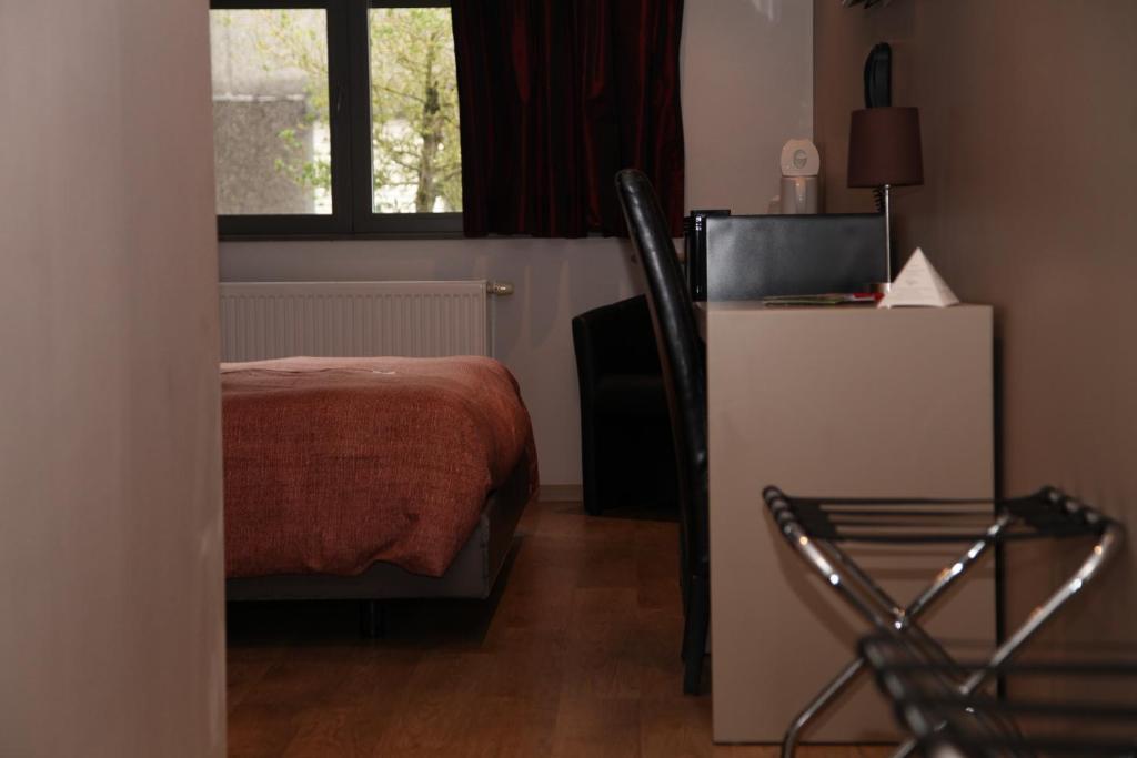 Postel nebo postele na pokoji v ubytování Hotel Callecanes