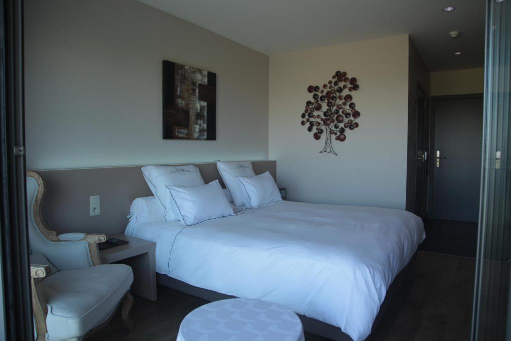 Postel nebo postele na pokoji v ubytování Hotel Callecanes
