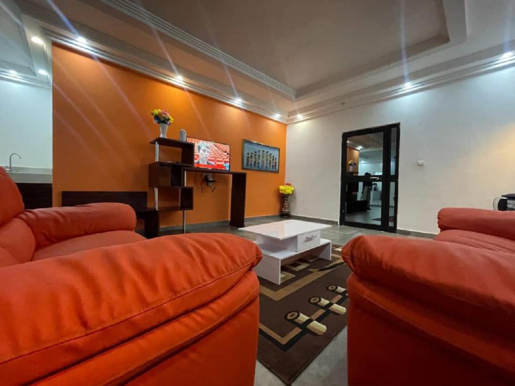 Posezení v ubytování Hôtel Guest House Quatre Saisons