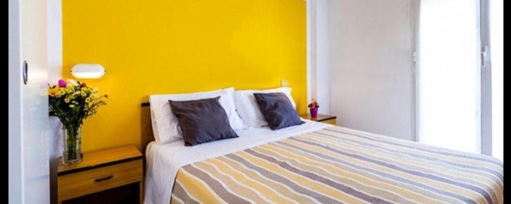 Postel nebo postele na pokoji v ubytování Hotel Bing