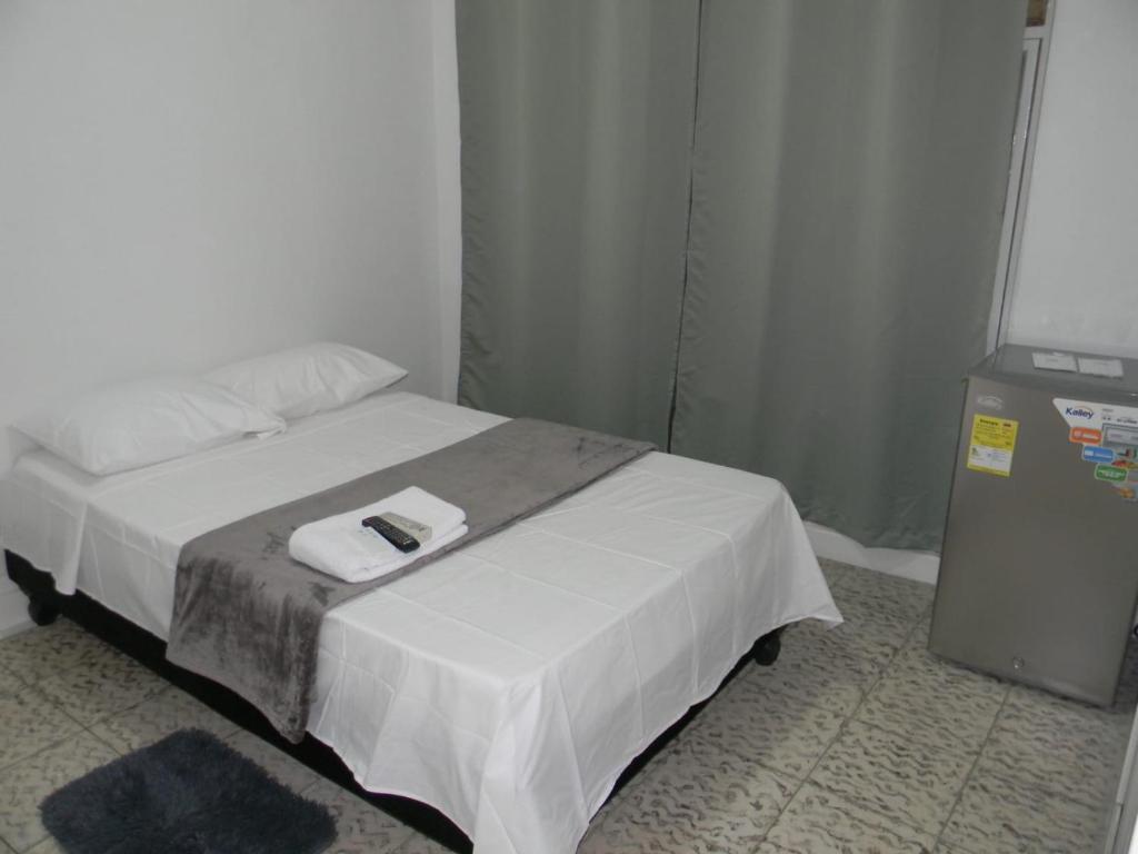 Postel nebo postele na pokoji v ubytování HOSPEDAJE'S HE