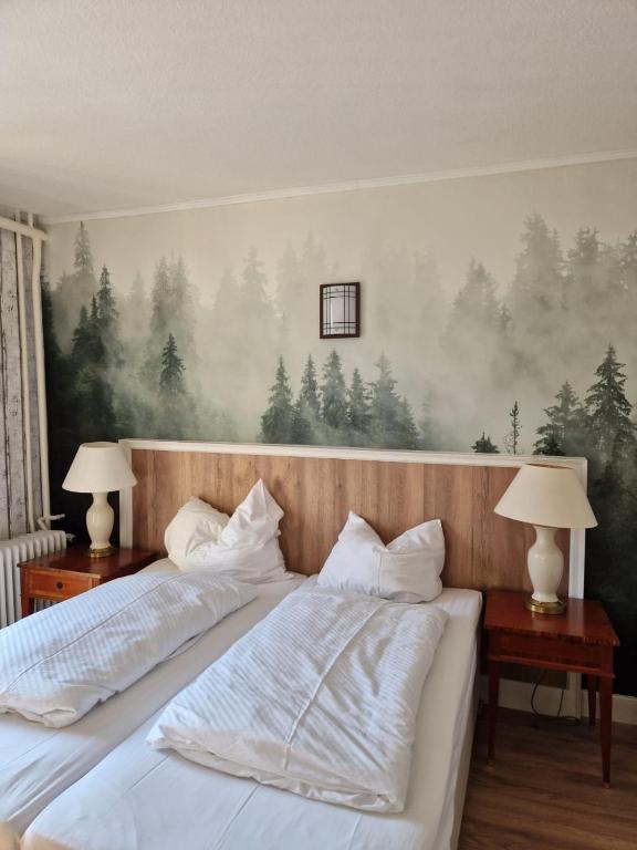 Postel nebo postele na pokoji v ubytování Harz Hotel Waldhaus