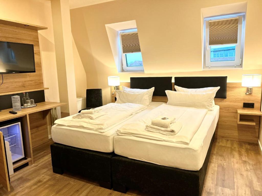 Postel nebo postele na pokoji v ubytování Sure Hotel by Best Western Wilhelmshaven City