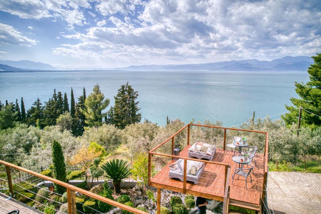 a house with a view of the water at Magical View Studios 1 Asproneri, Kamena Vourla in Kamena Vourla