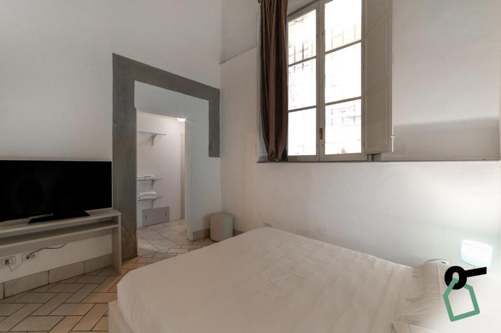 TV a/nebo společenská místnost v ubytování Hotiday Room Collection - Firenze Ghibellina