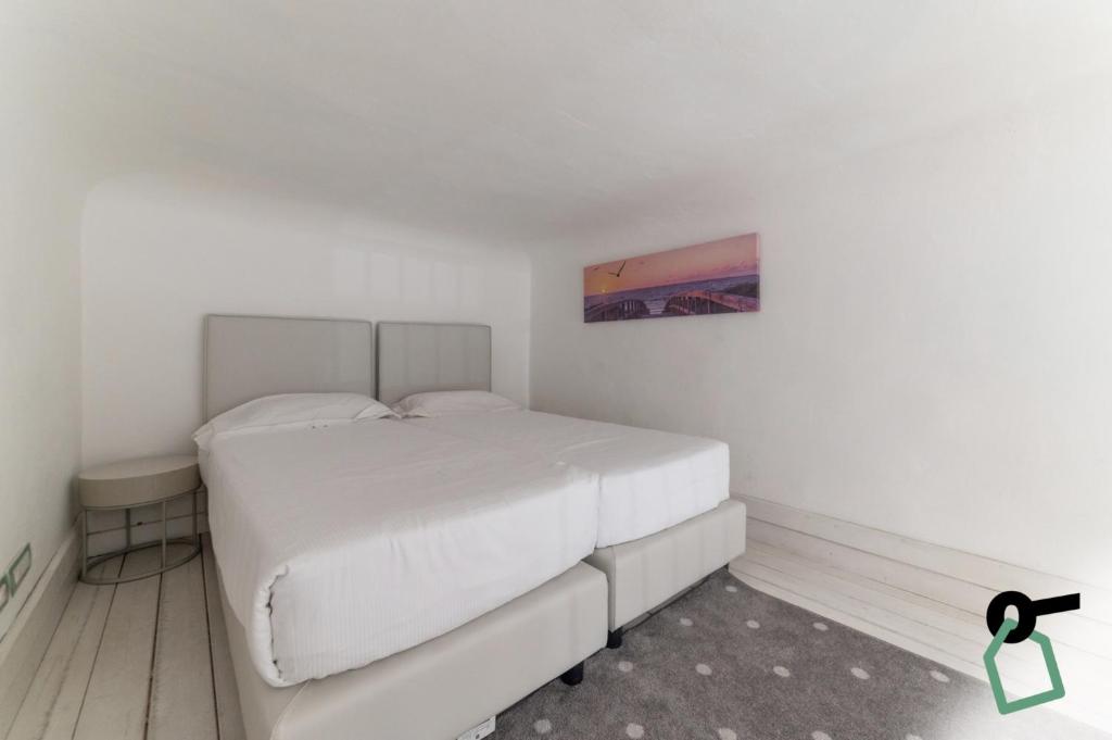 Postel nebo postele na pokoji v ubytování Hotiday Room Collection - Firenze Ghibellina