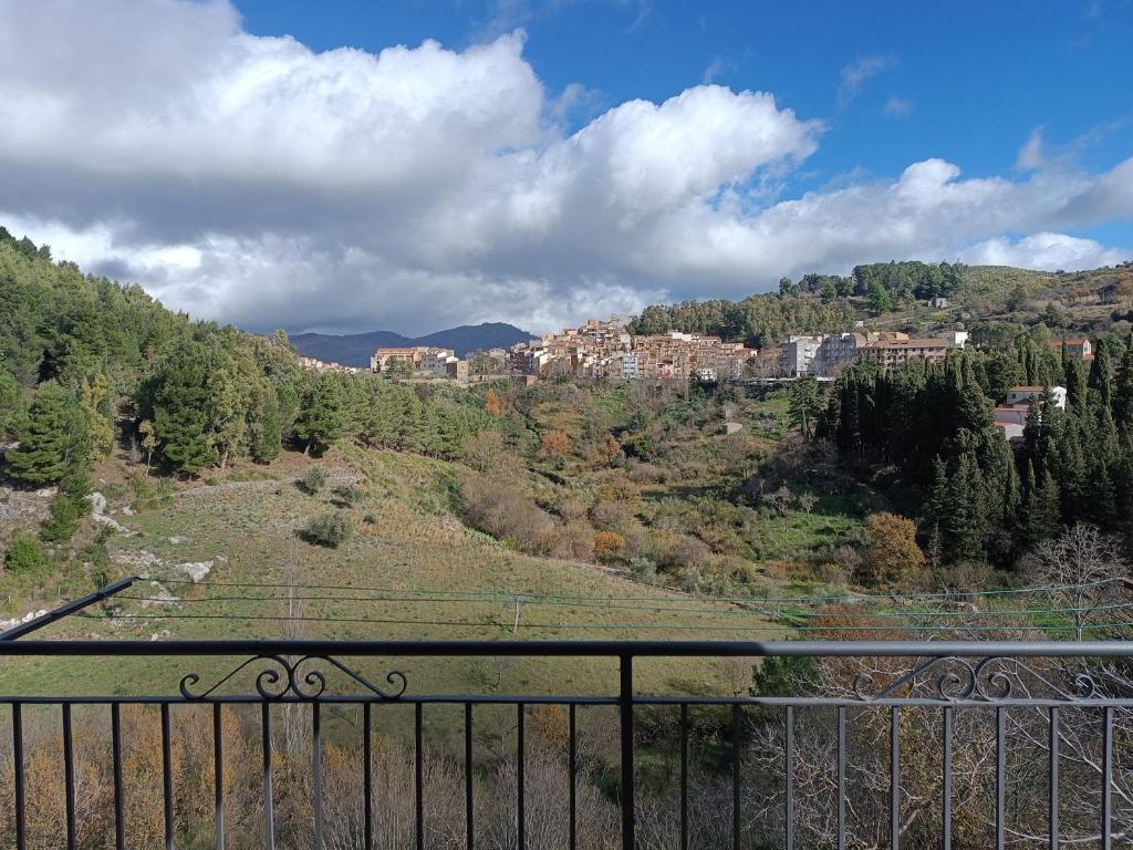 a view from a balcony of a town on a hill at Casa Belvedere in Isnello