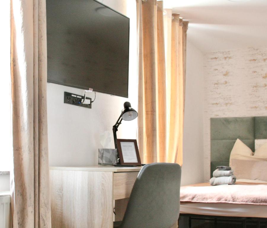 TV a/nebo společenská místnost v ubytování The Manhattan A Boutique Hotel By American Ease