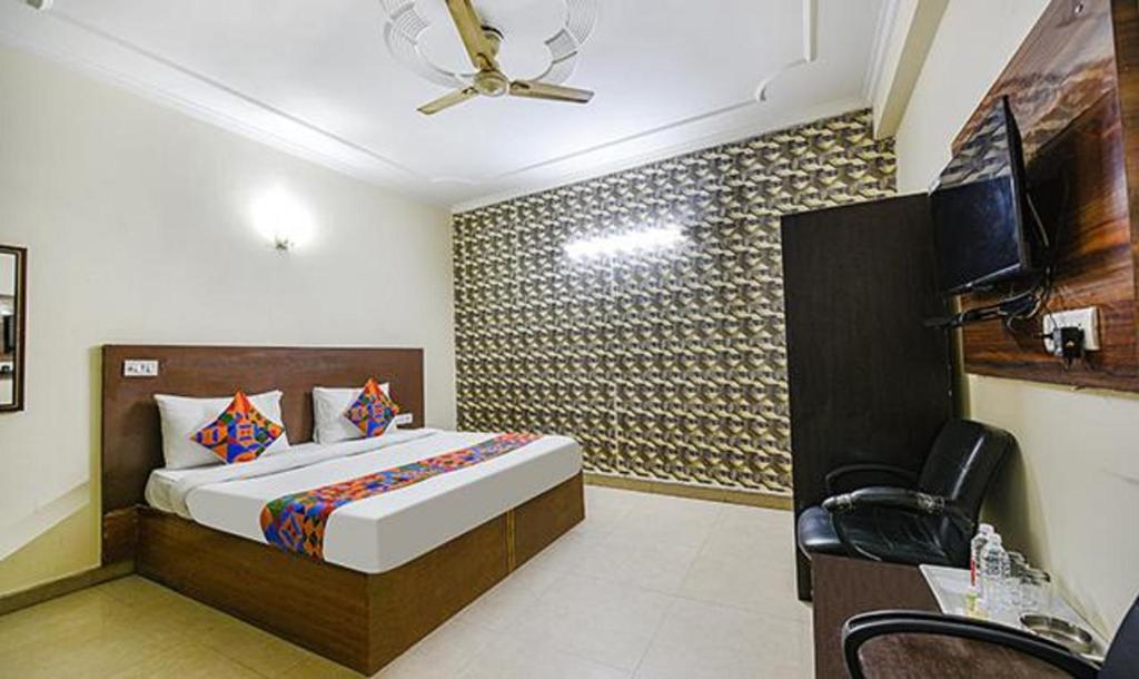 Postel nebo postele na pokoji v ubytování Hotel Smart Stay