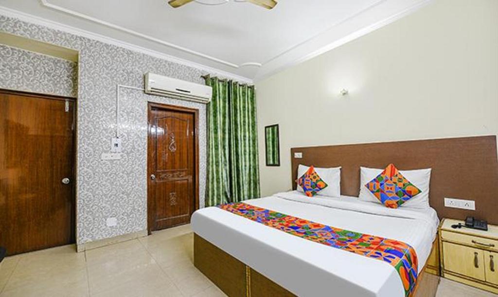 Postel nebo postele na pokoji v ubytování Hotel Smart Stay