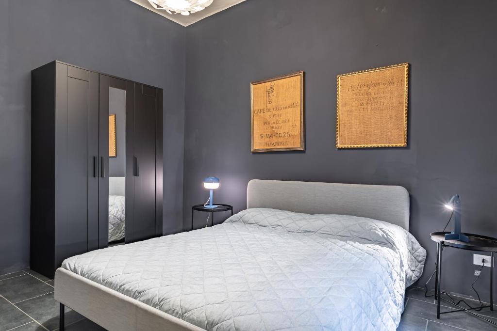 En eller flere senger på et rom på Relais Mangano - Apartment - by HOST4U