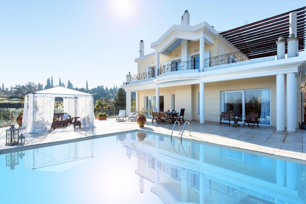 The swimming pool at or close to Magnificent Perama Villa - 4 Bedrooms - Villa Noulia - Gym - Great Pool Area - Corfu