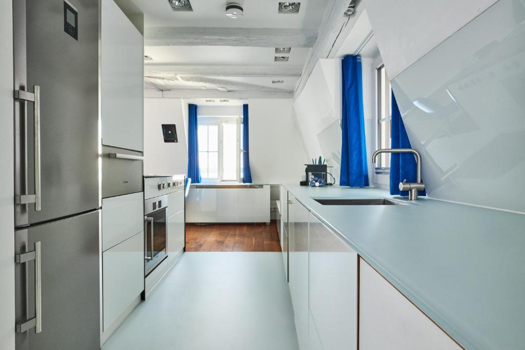 Kuchyň nebo kuchyňský kout v ubytování Hotel Max am See