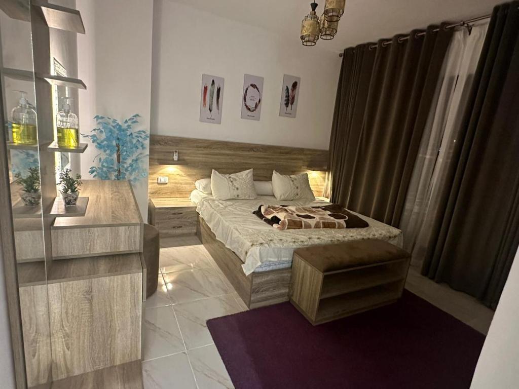 Säng eller sängar i ett rum på Fully furnished apartment