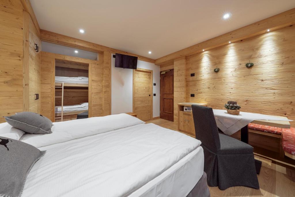 Łóżko lub łóżka w pokoju w obiekcie Hotel Columbia & Spa