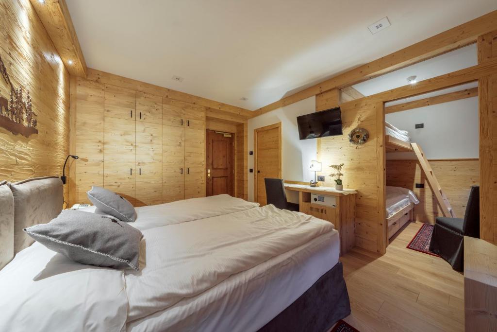 Łóżko lub łóżka w pokoju w obiekcie Hotel Columbia & Spa