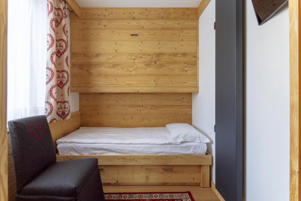Łóżko lub łóżka w pokoju w obiekcie Hotel Columbia & Spa