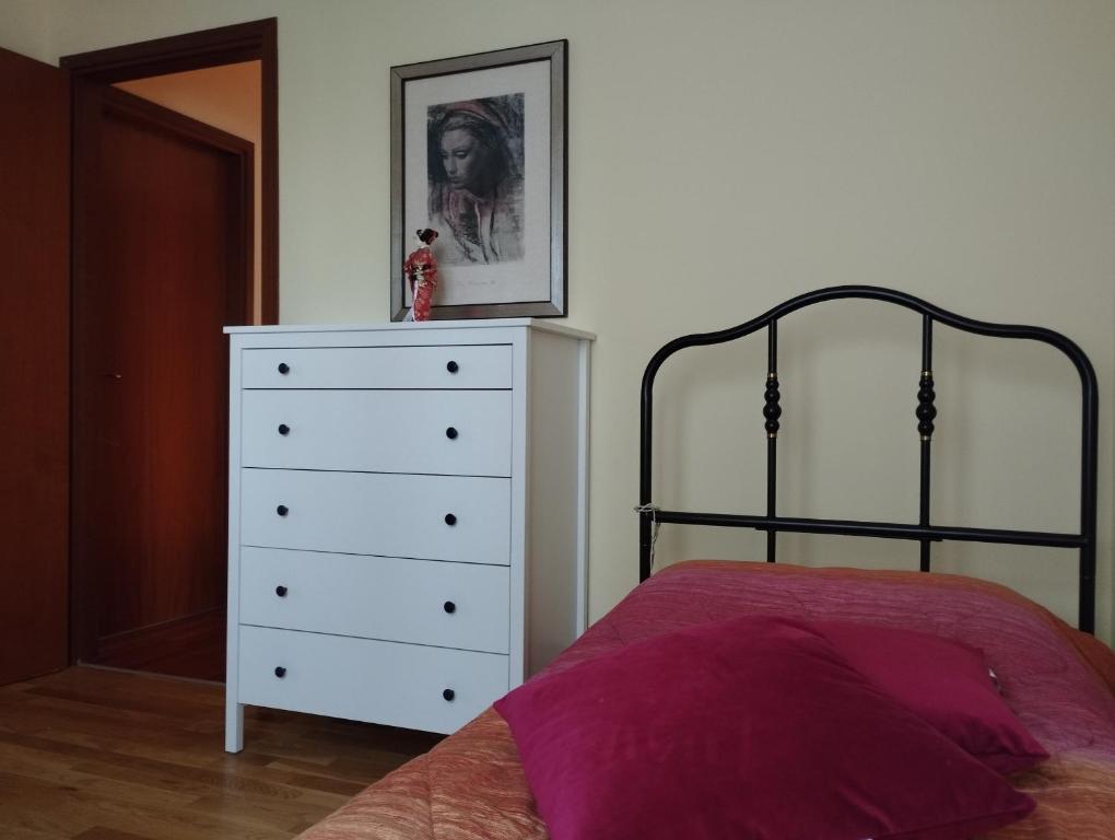 Łóżko lub łóżka w pokoju w obiekcie Civico 51Appartamento a Sassuolo