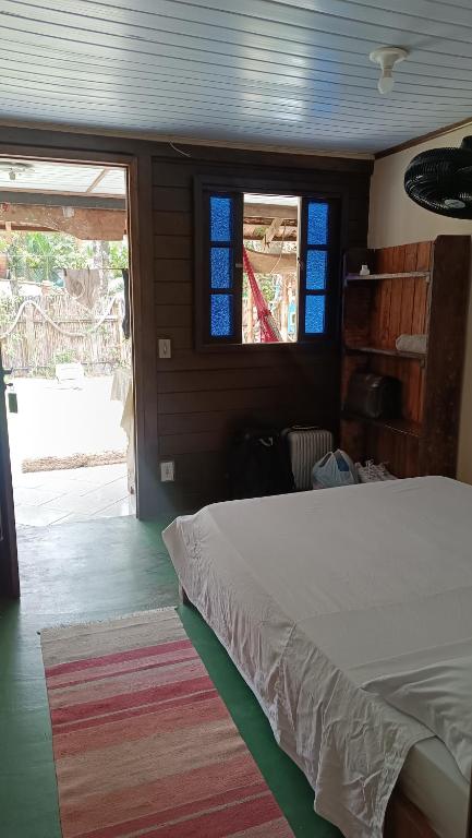 Cama ou camas em um quarto em Pousada Sobre as Ondas - ILHA DO MEL - PR