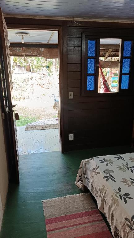 Cama ou camas em um quarto em Pousada Sobre as Ondas - ILHA DO MEL - PR