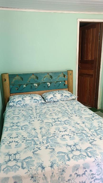 Cama ou camas em um quarto em Pousada Sobre as Ondas - ILHA DO MEL - PR