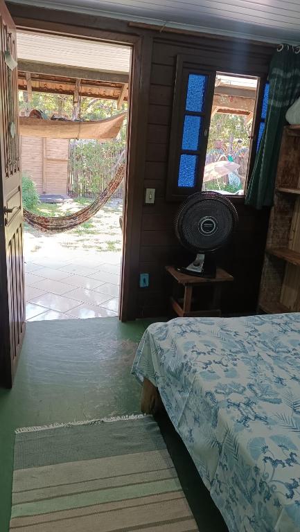 Cama ou camas em um quarto em Pousada Sobre as Ondas - ILHA DO MEL - PR