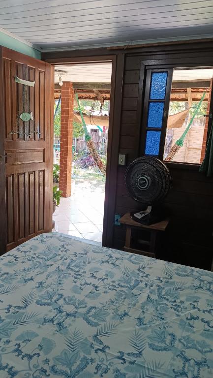 Cama ou camas em um quarto em Pousada Sobre as Ondas - ILHA DO MEL - PR