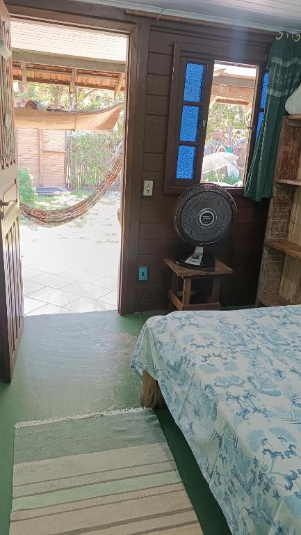 Cama ou camas em um quarto em Pousada Sobre as Ondas - ILHA DO MEL - PR