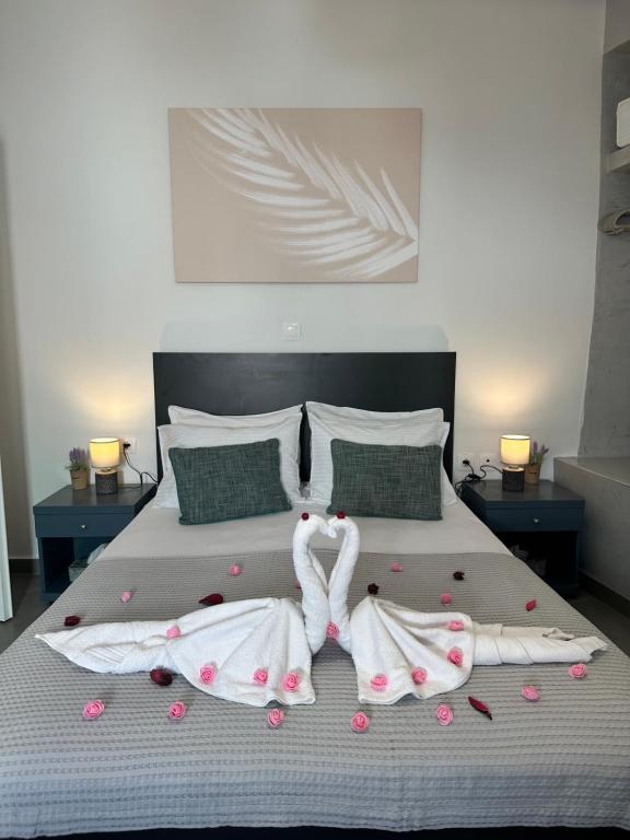 Postel nebo postele na pokoji v ubytování White Swallow Suite Santorini