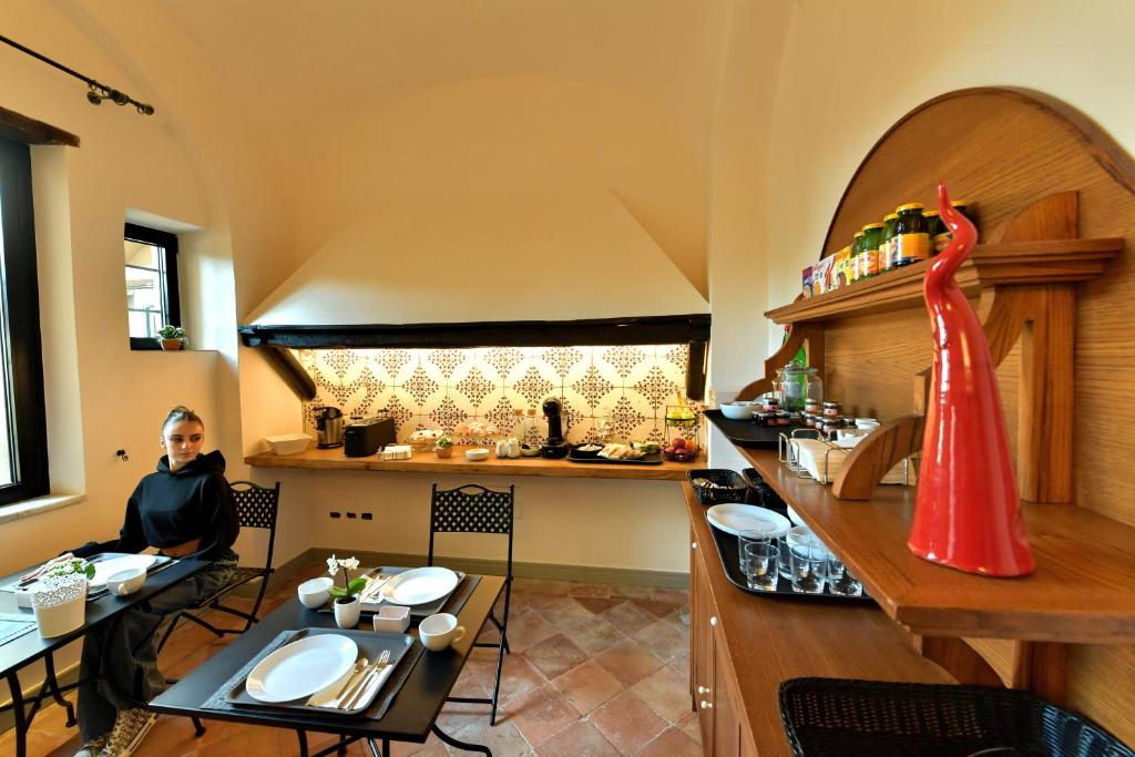 Гостиная зона в In Costa Relais & Luxury Suites